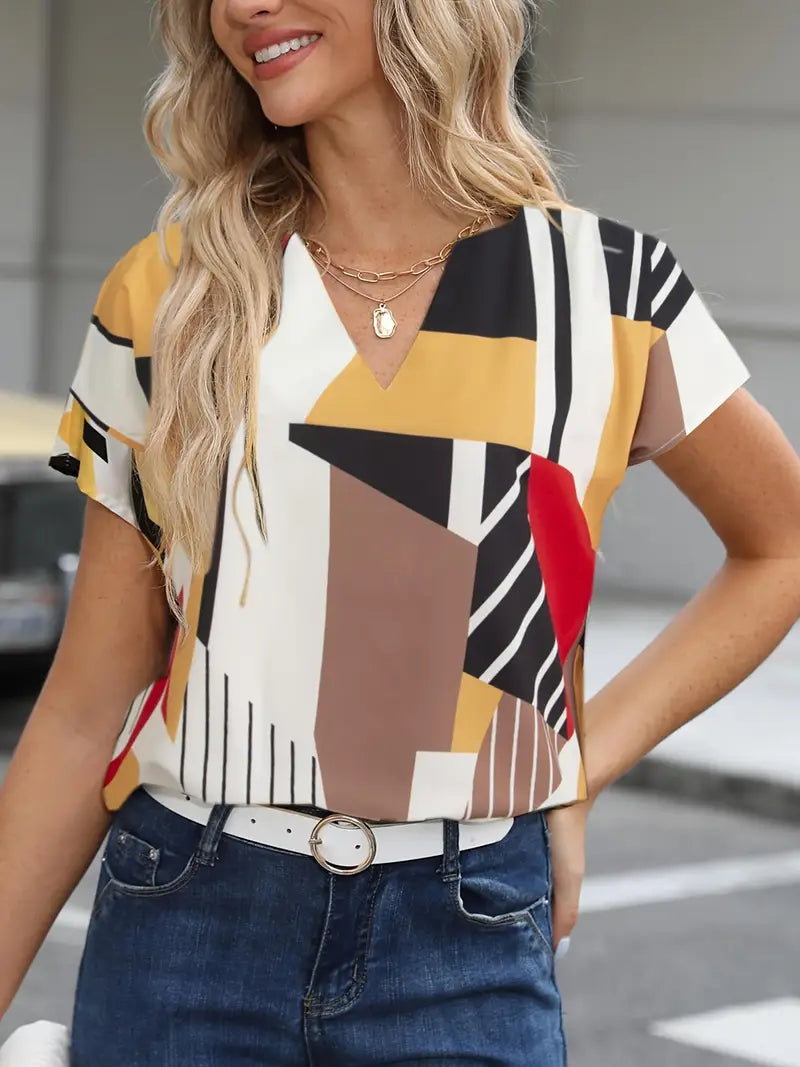 Nathalie™ – V-ringad Topp med Grafiskt Tryck