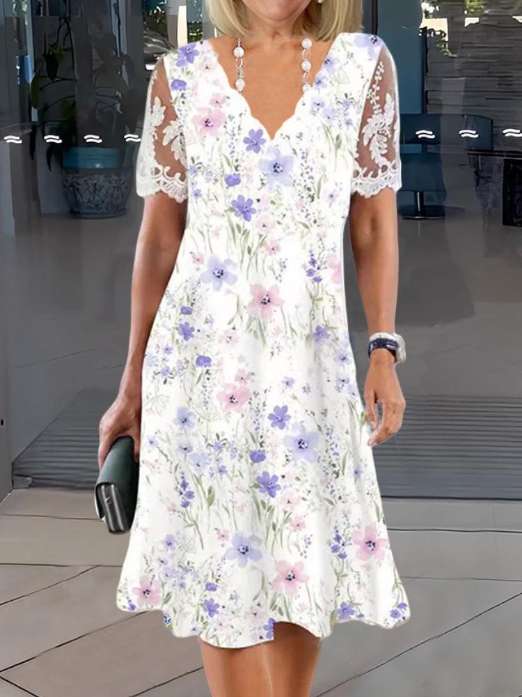 Nina™ - Elegant Blommig Spetsklänning